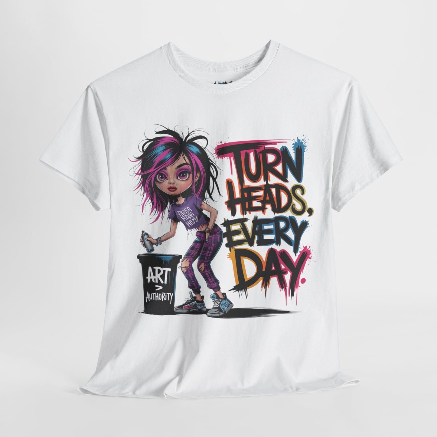White “Turn Heads Every Day” tee hanging on a minimalist hanger – fresh, fierce, and serving clean girl confidence.