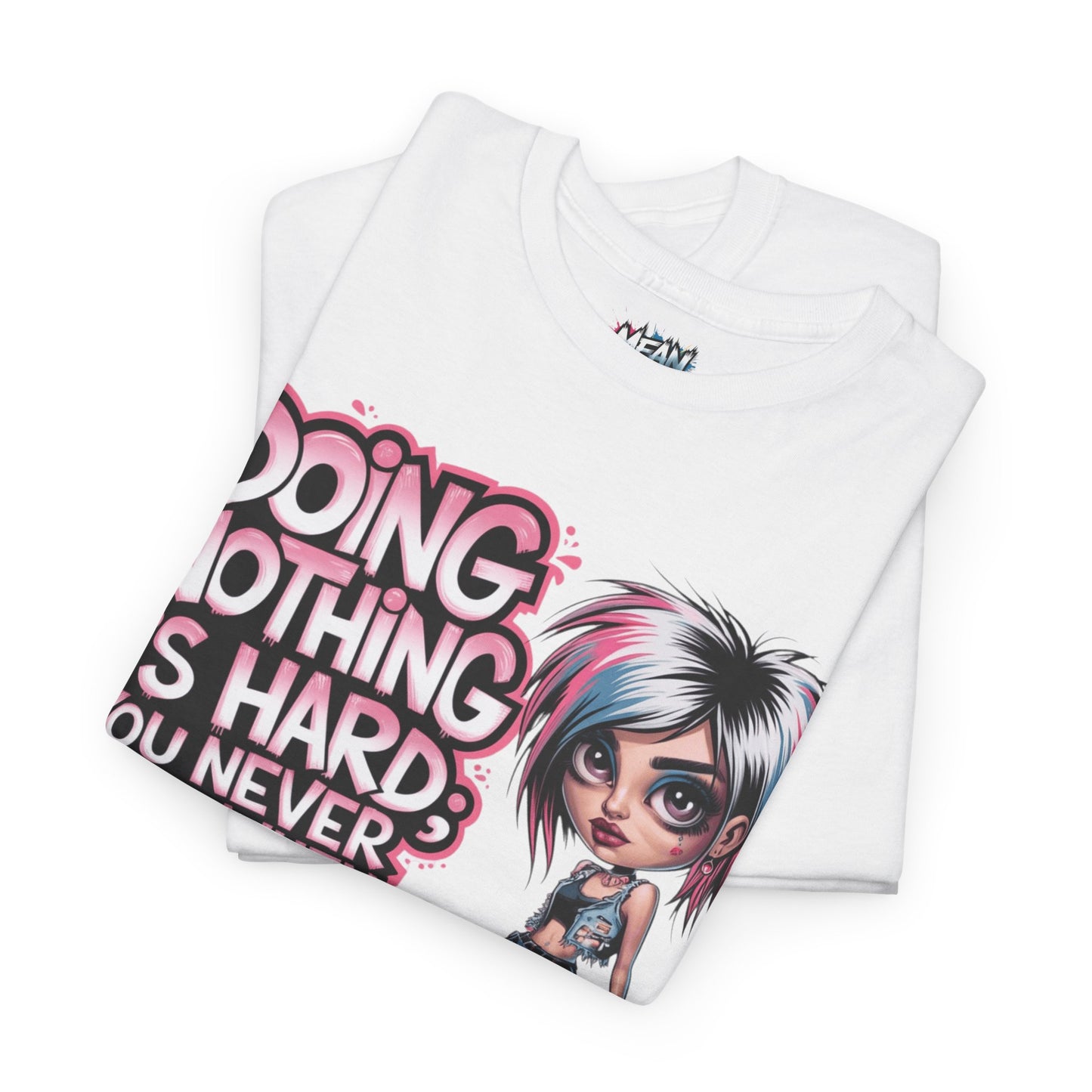 Folded white tee of graphic design – illustrated woman with ‘Doing Nothing Is Hard’ text”